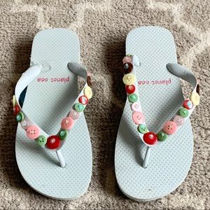 NWT Planet Sea flip flops